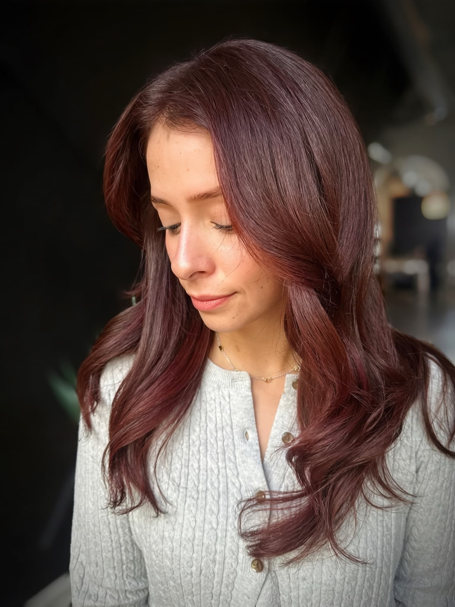 Deep burgundy color on long hair, glossy and even from root to end